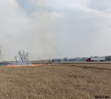 Burning pasture next to I-70